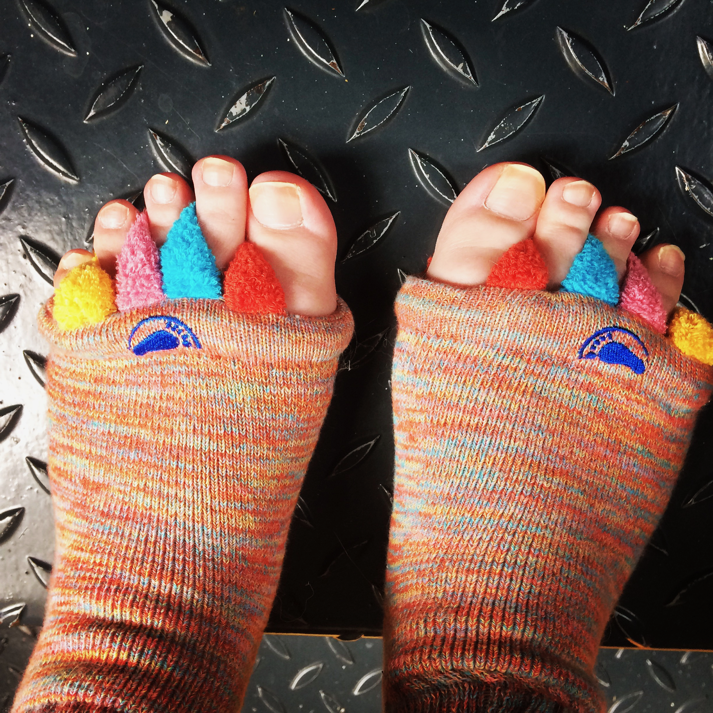 Toe spacer socks to try to shift the right big toe joint so it hurts less.