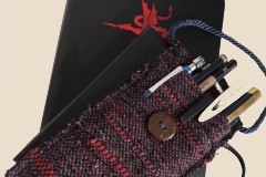 A pen pouch (works for both sketching and writing) helps