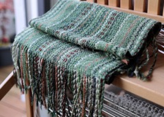 A handwoven green, just finished and sitting on the loom